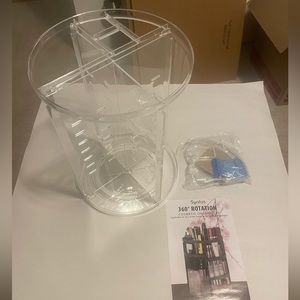 Clear plastic rotating make up organizer